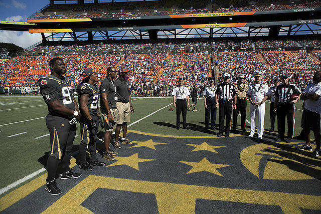 Football players at Aloha Stadium