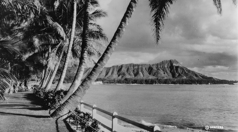 A black and white image of Diamond Head Crater from Waikiki