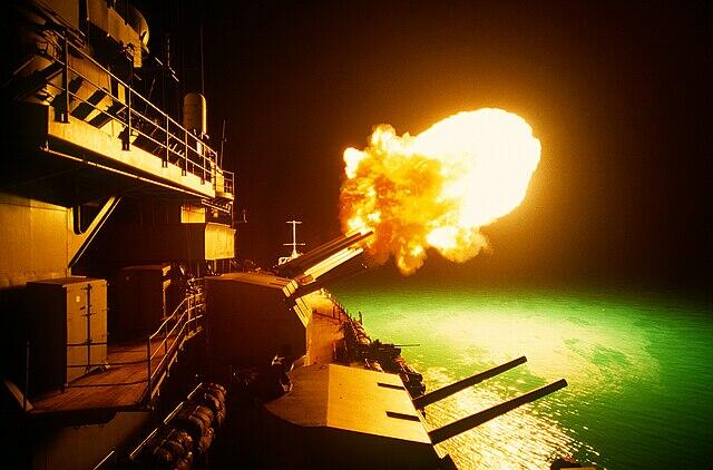 USS Missouri firing in the water during Desert Storm
