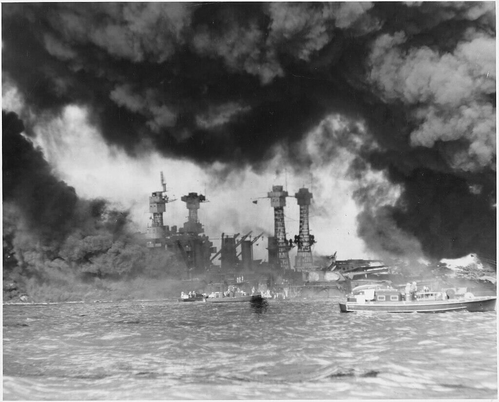 USS Virginia sinking in the ocean with smoke around her