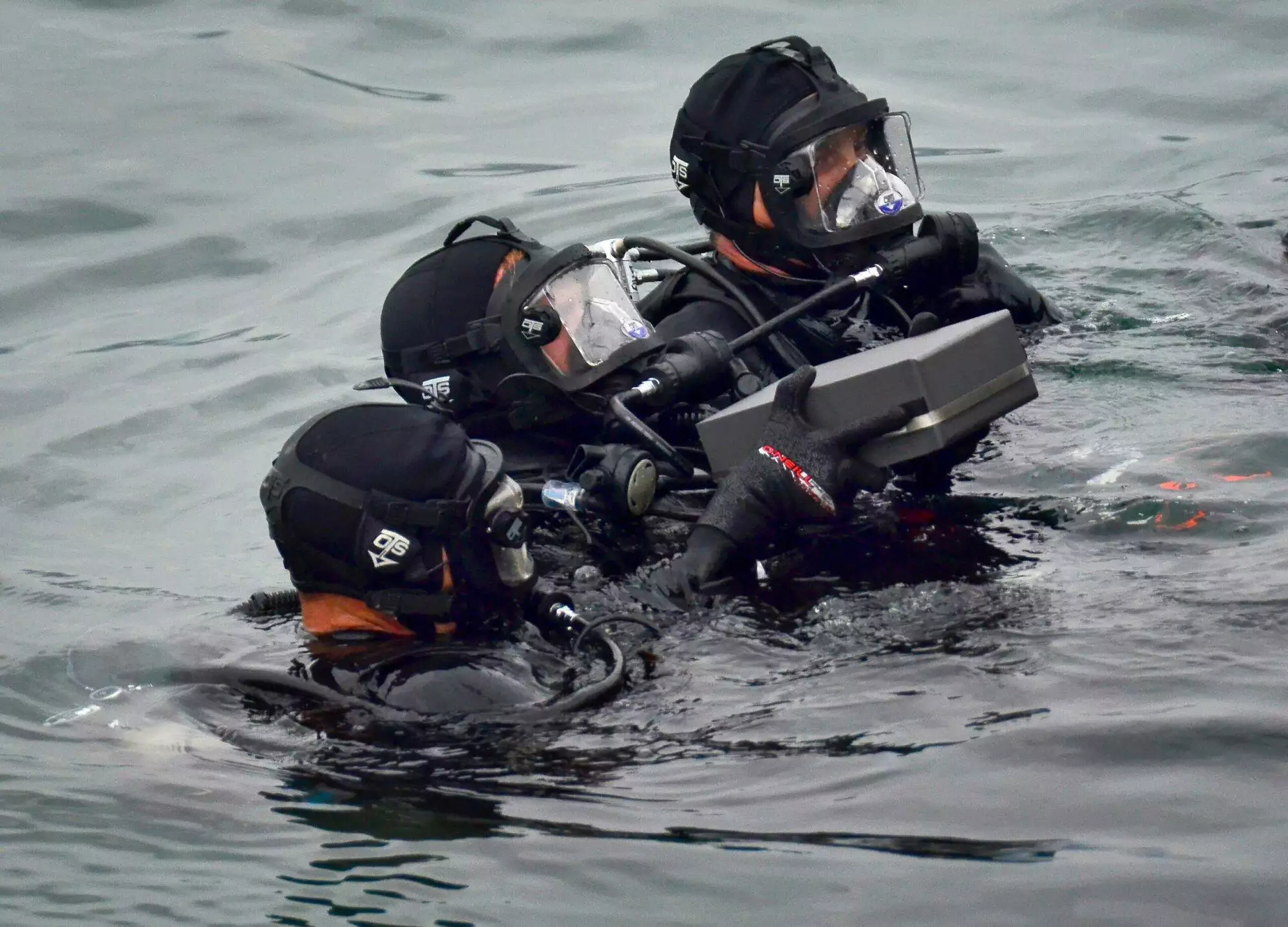 US Navy Divers preparing for interment of ashes inside the USS Arizona