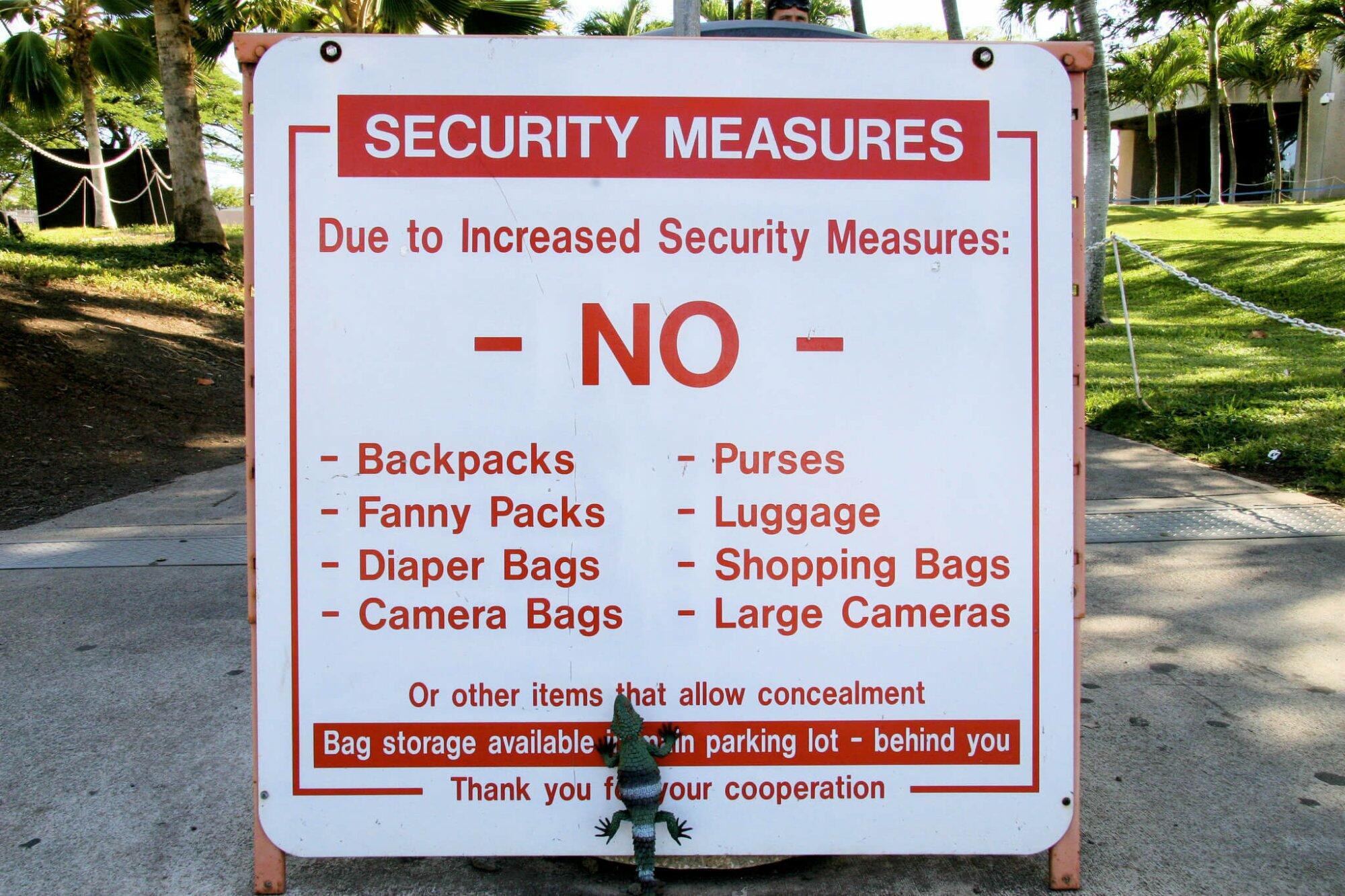 A sign near the entrance to Pearl Harbor stating bags are not allowed inside