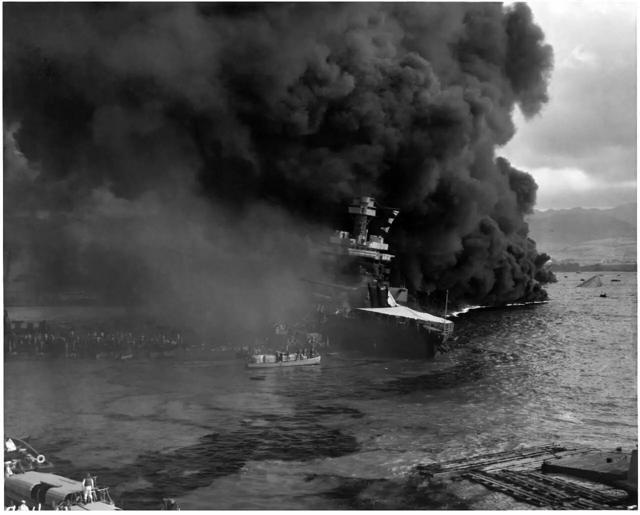 Men abandoning USS California (BB-44), 7 December 1941