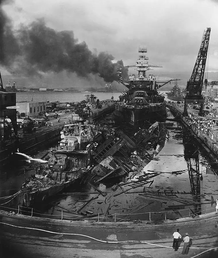 USS Downes (DD-375) at lower left, with USS Cassin (DD-372) capsized against her. USS Pennsylvania (BB-38) is directly aft.