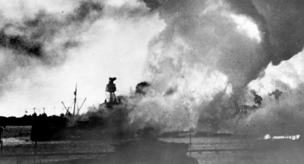 USS Vestal is visible to the left of the burning USS Arizona