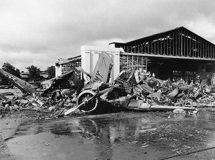 Piles of rubble from destroyed aircraft that never left the ground during the attack on Pearl Harbor. 